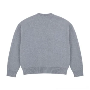 Ash gray minimalist drop shoulder wool blend knit cardigan back view with ribbed crew neck and hem