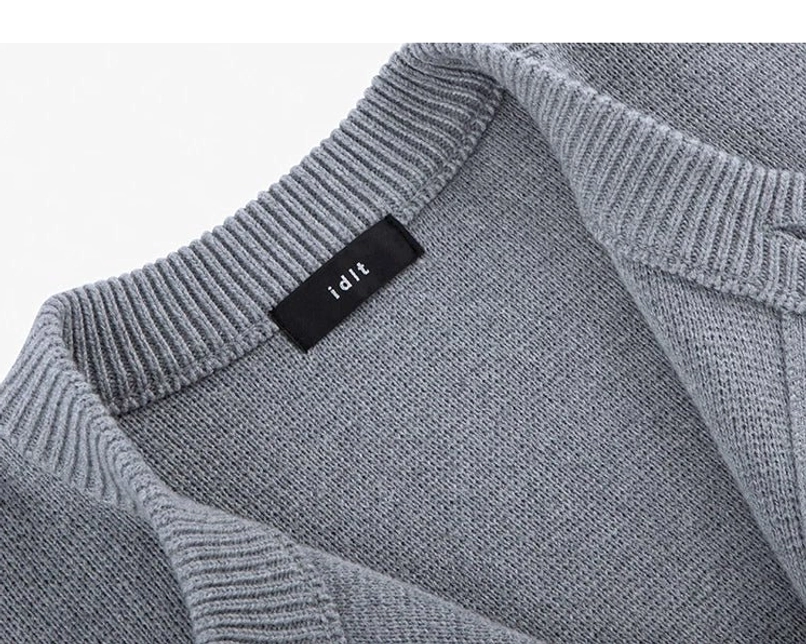 Minimalist drop shoulder wool blend knit cardigan relaxed crew neck silhouette product view