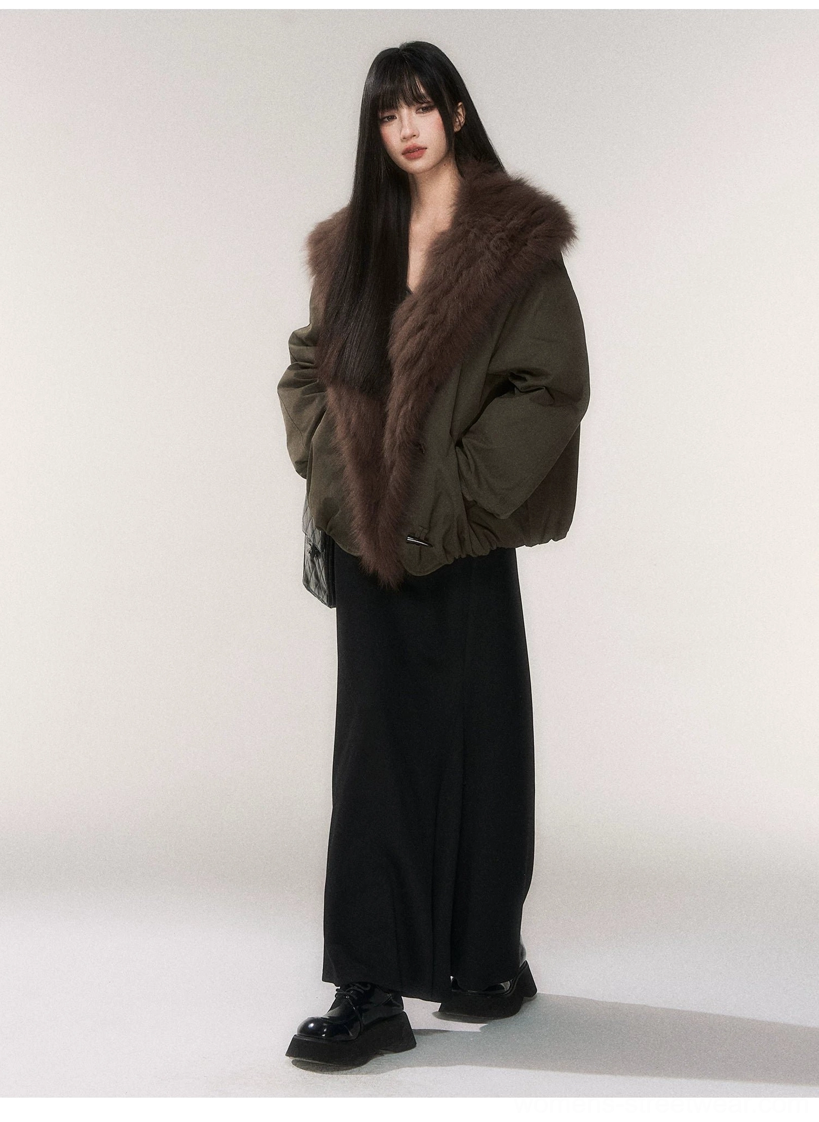 Minimalist knit fishtail maxi skirt in black and dark gray for elevated Korean inspired winter streetwear styling