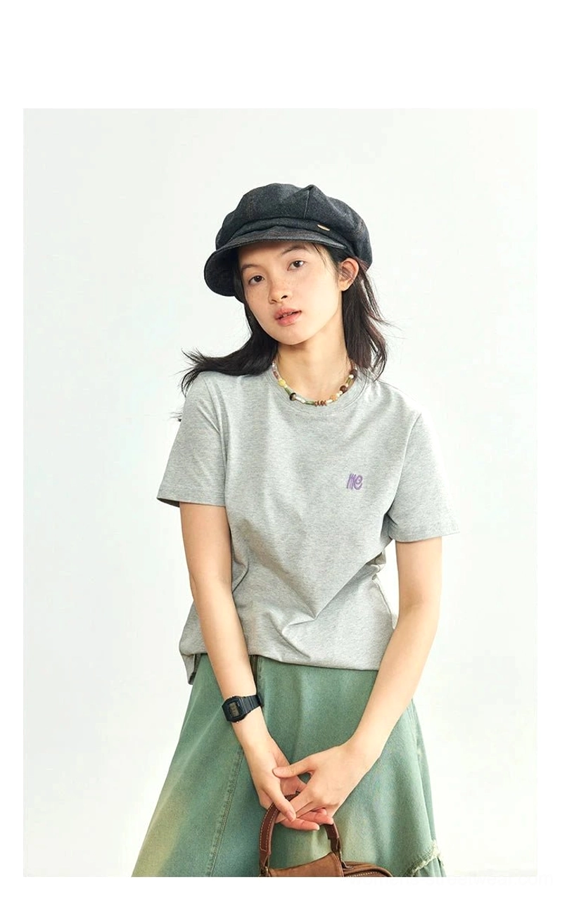 Minimalist embroidered logo crew neck t-shirt fabric texture quality cotton polyester blend material