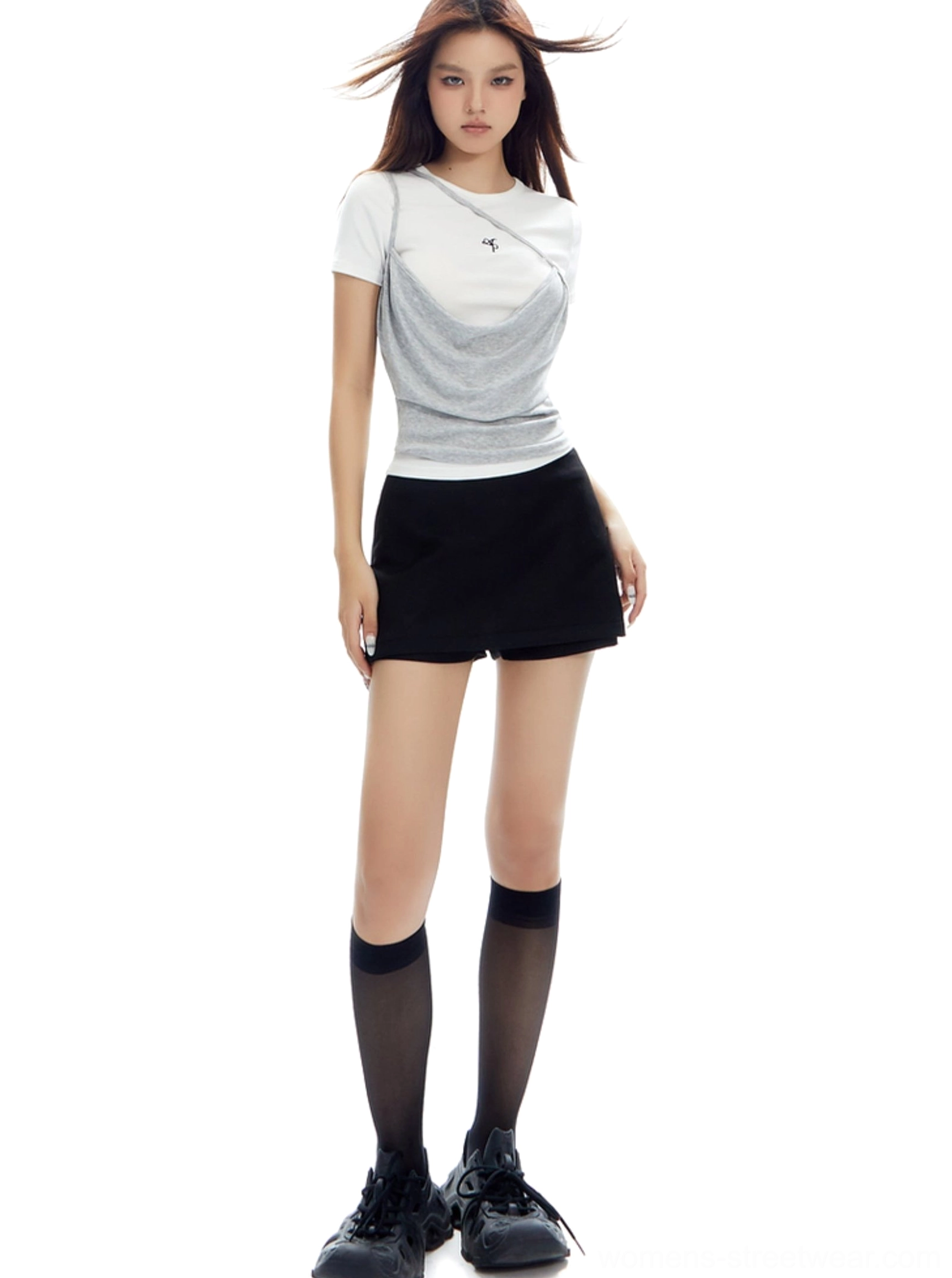 Minimalist low-rise mini skirt with clean suiting-style finish for contemporary East Asian streetwear looks