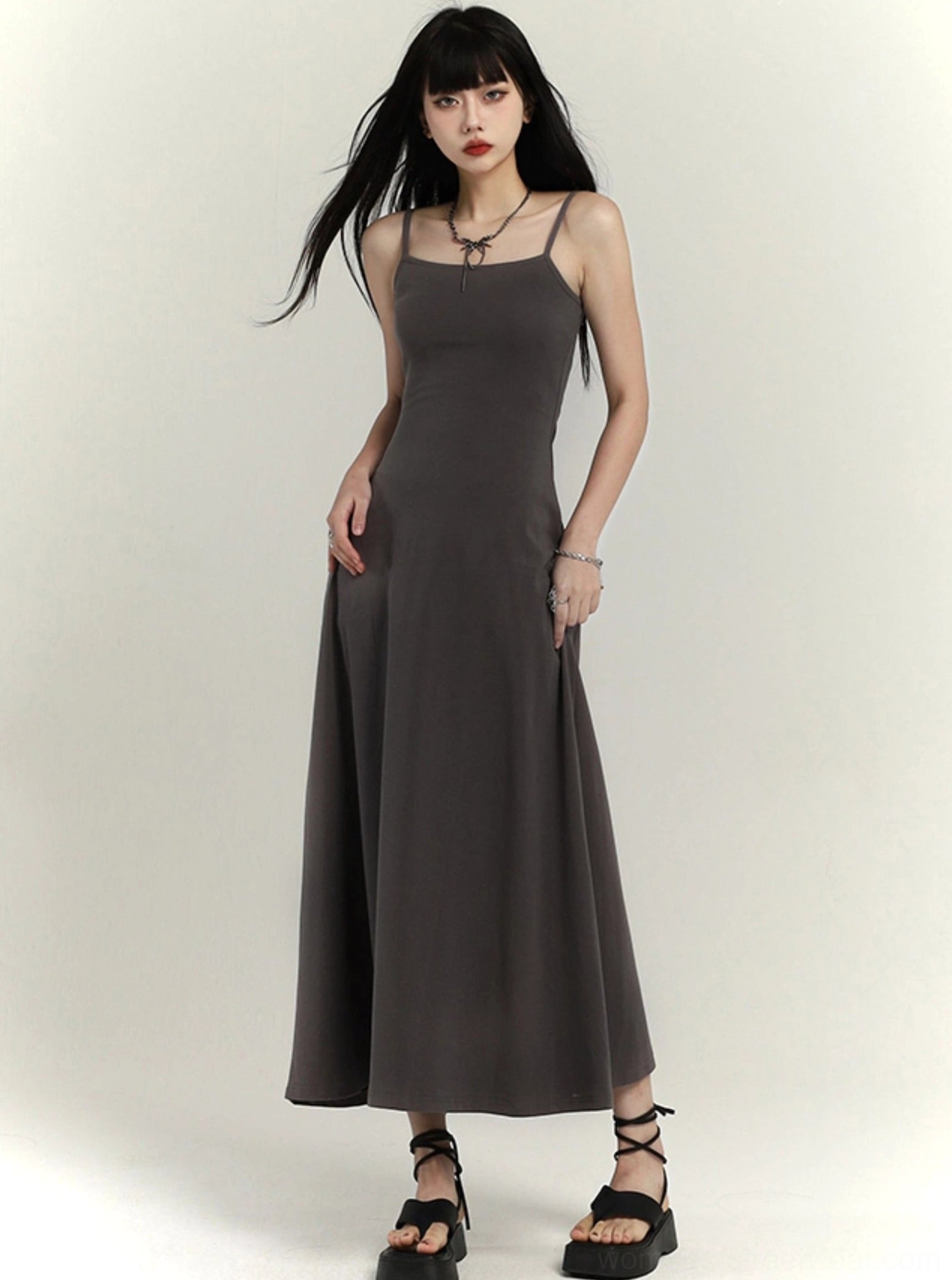 Gray minimalist square neck waist-defined maxi slip dress front full body view with flared skirt