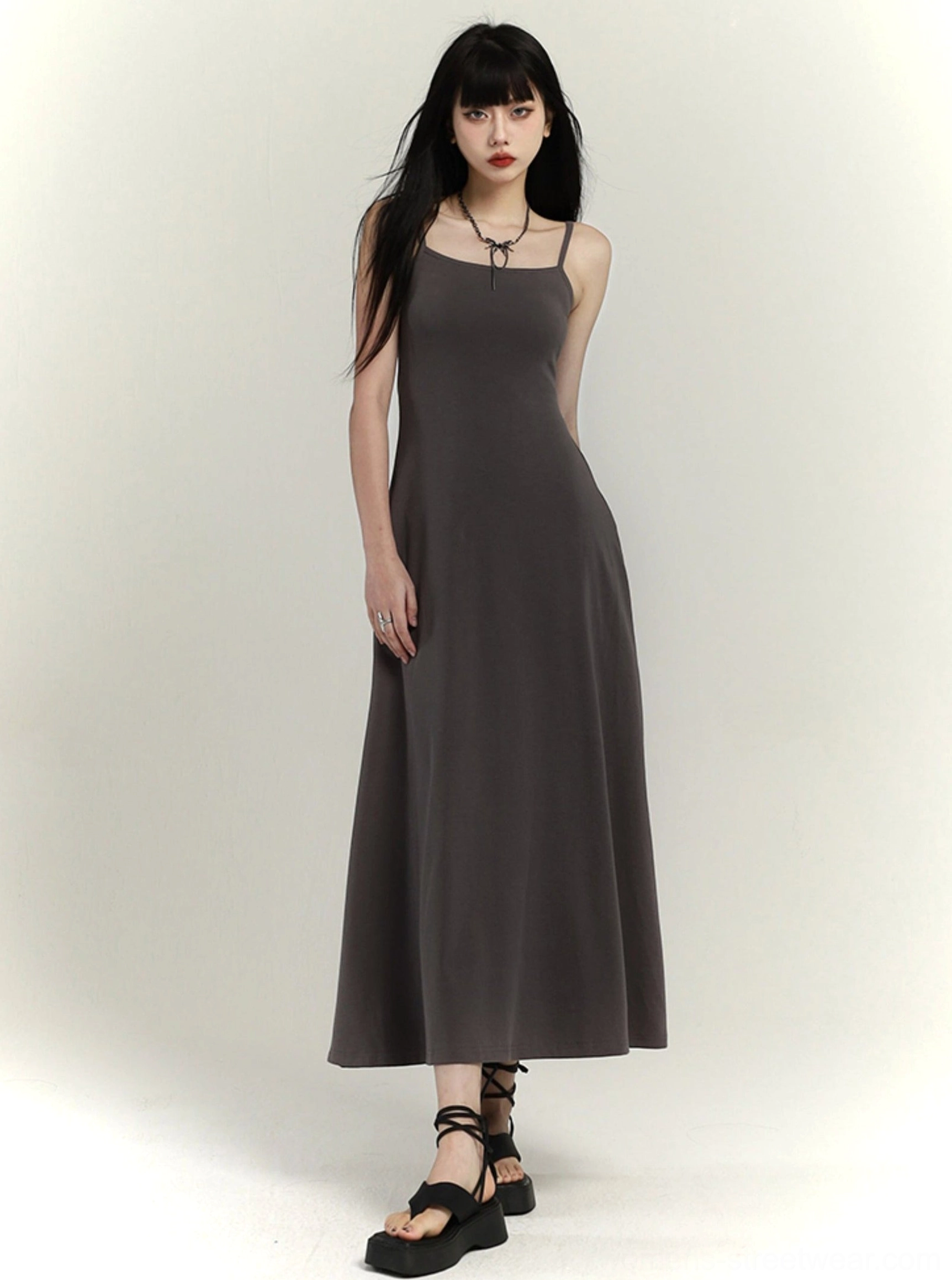 Gray square neck maxi slip dress in minimalist Korean streetwear styling front three-quarter view