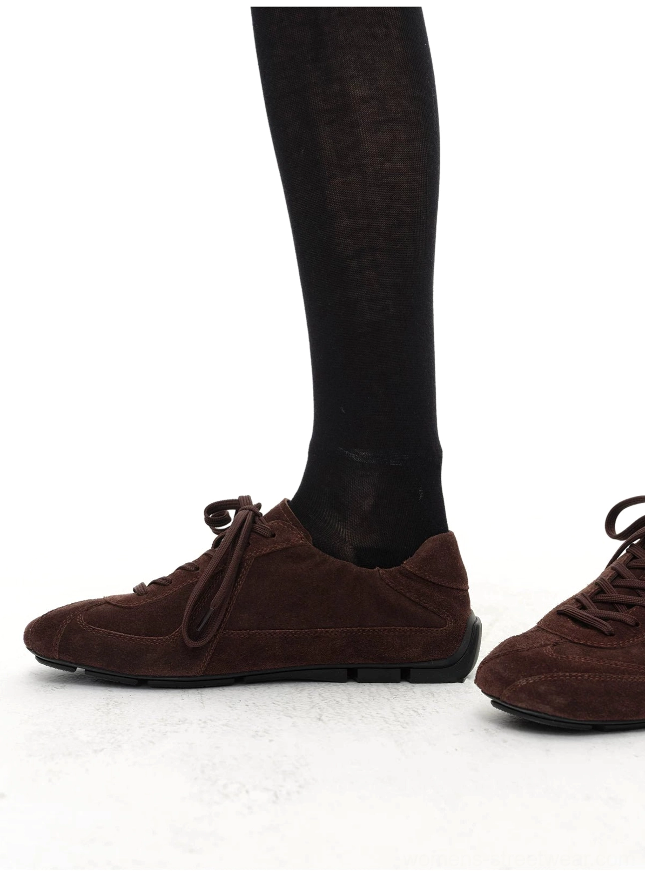 Minimalist suede lace-up sneakers with layered panel detailing and a flat everyday sole for modern streetwear outfits