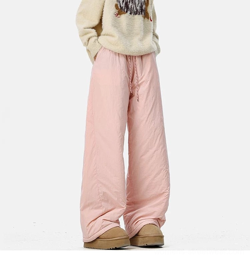Minimalist urban wide-leg pants with cozy fleece construction and flexible drawstring streetwear styling