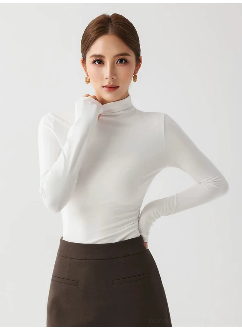 Minimalist women's mock neck long sleeve base top for Seoul fashion inspired layered outfits