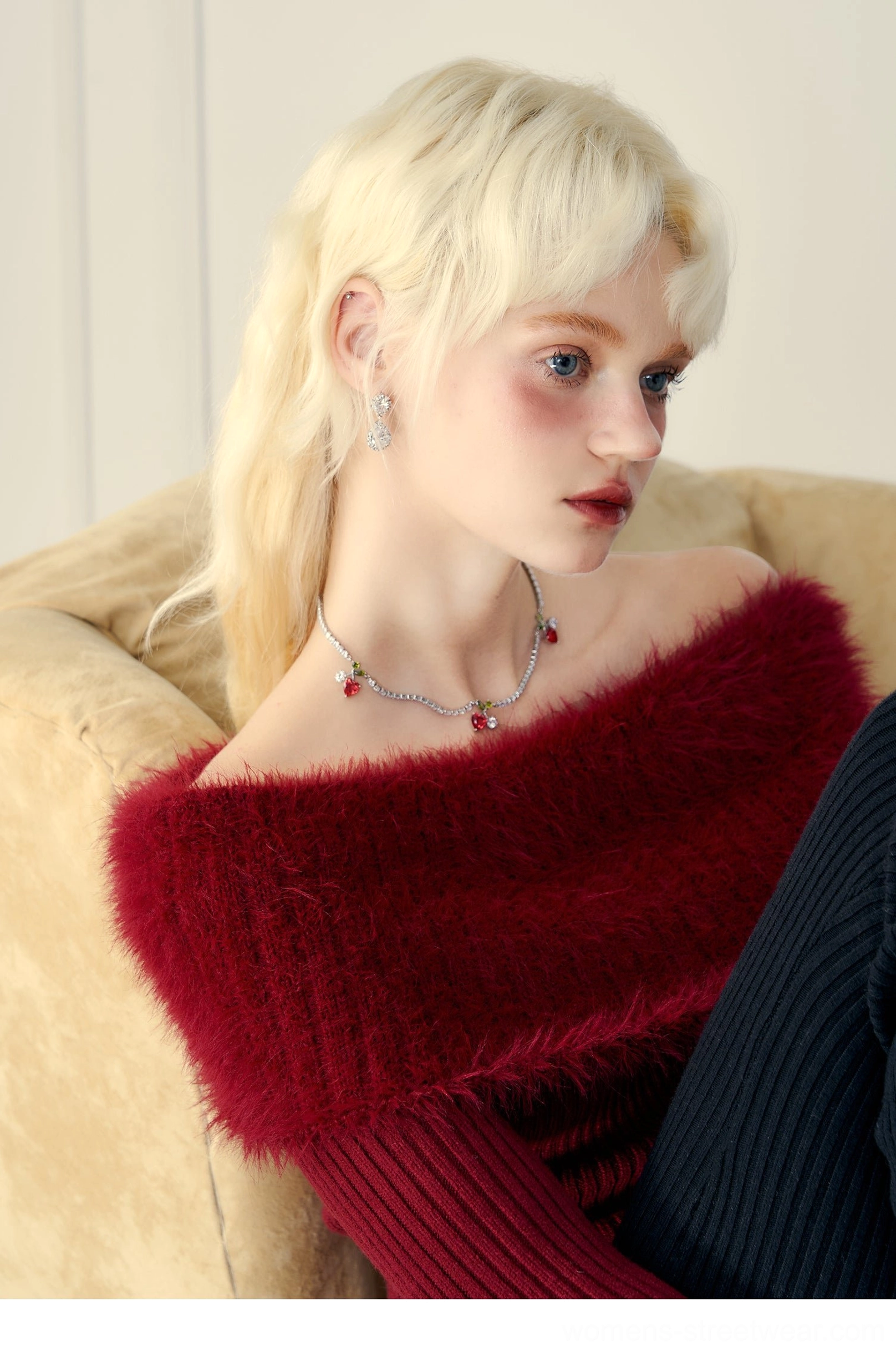 Mink cashmere off-shoulder fur trim ribbed knit sweater long sleeve detail view