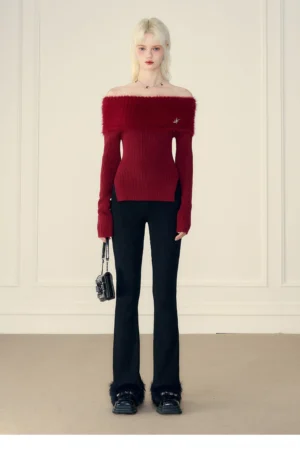 Wine red mink cashmere off-shoulder fur trim ribbed knit sweater styled with black flared trousers