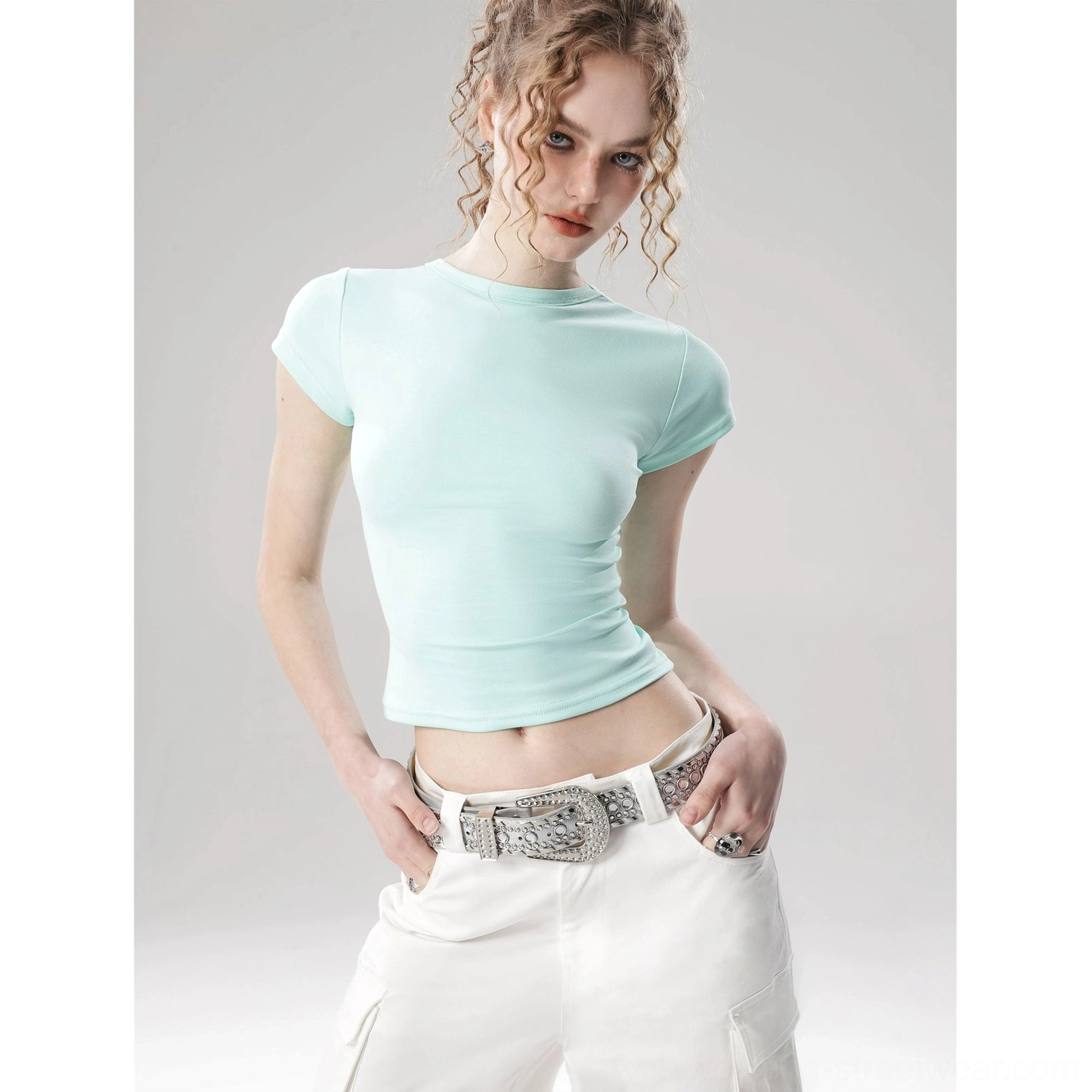 Mint blue solid color flutter sleeve cropped top with fitted crew neck for contemporary Korean streetwear