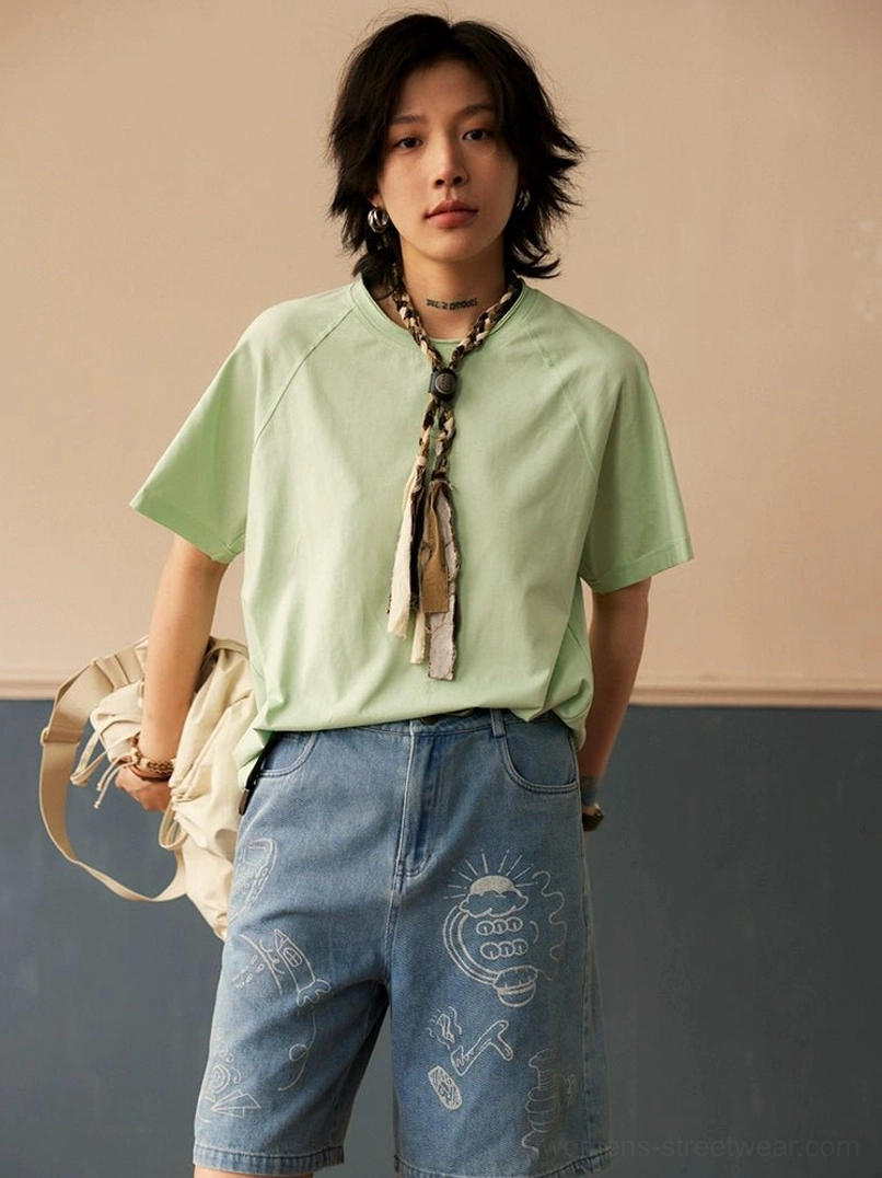 Mint green raglan crew neck t-shirt color and fit showcase, styled with contemporary streetwear pieces for full aesthetic view