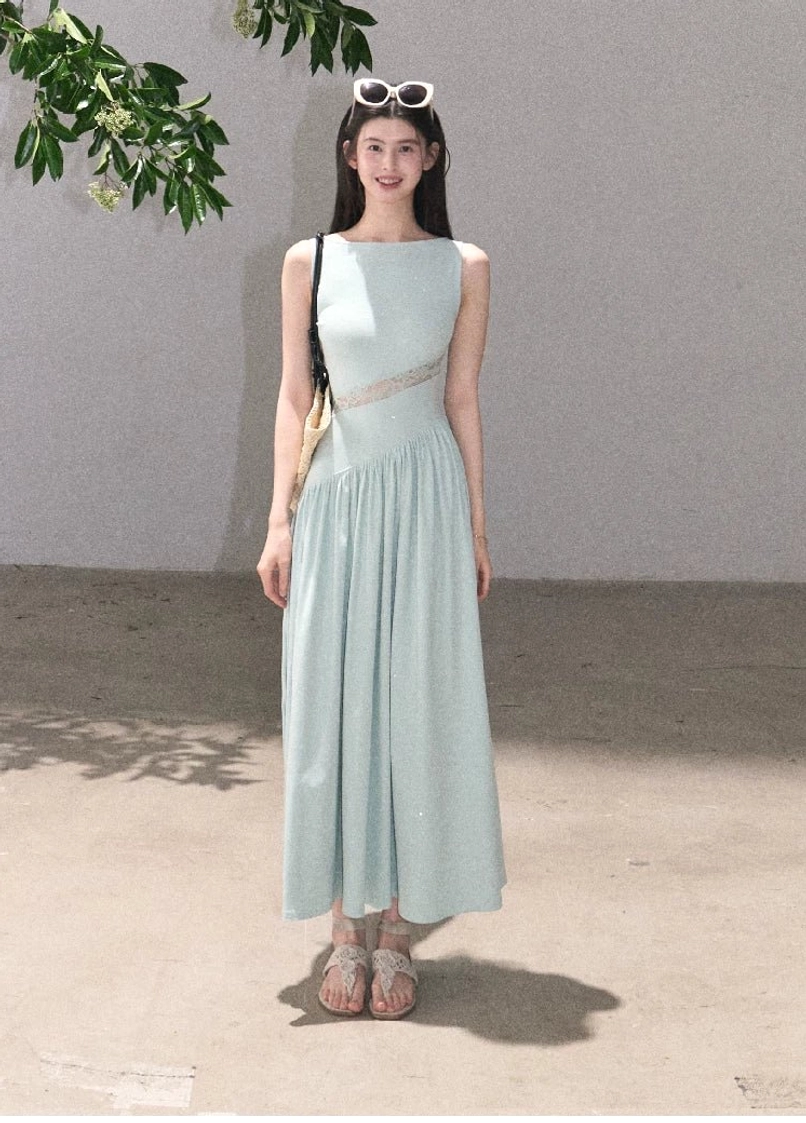 Mint mambo asymmetrical lace waist maxi dress with flowing skirt and contemporary East Asian fashion styling