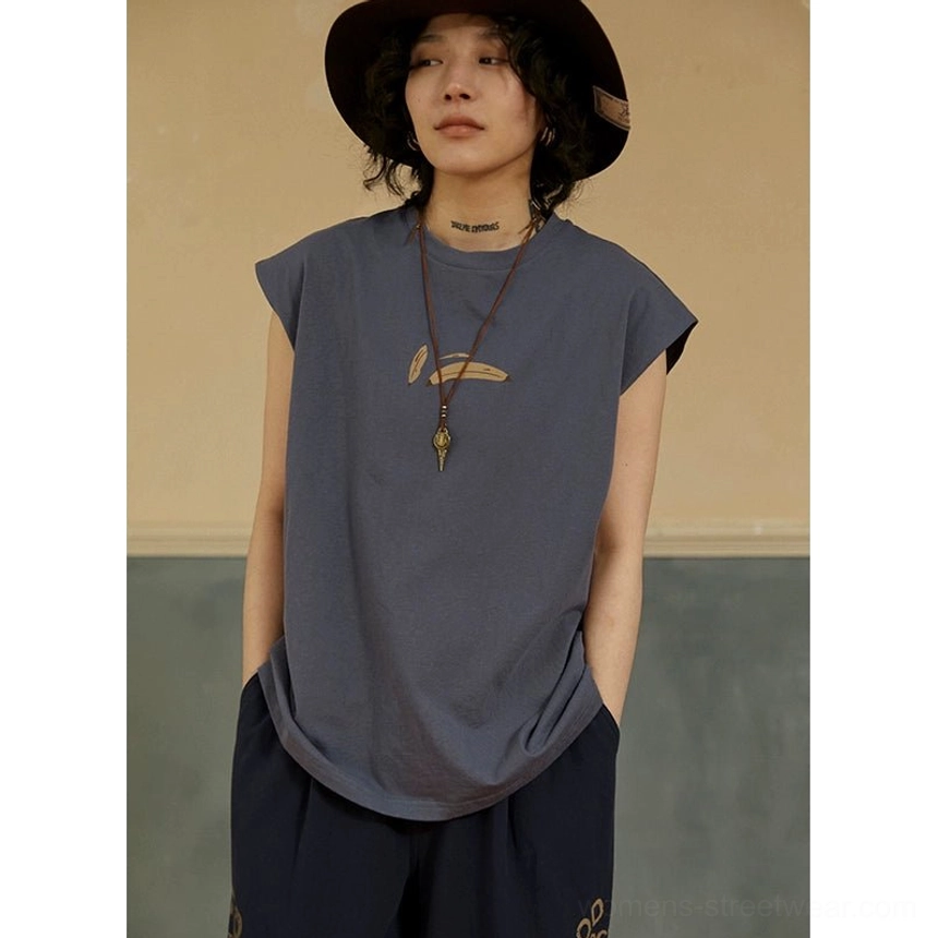 Close-up of Misty Purple Blue minimalist sleeveless tee with crew neck, curved hem, wide armholes, and chest graphic