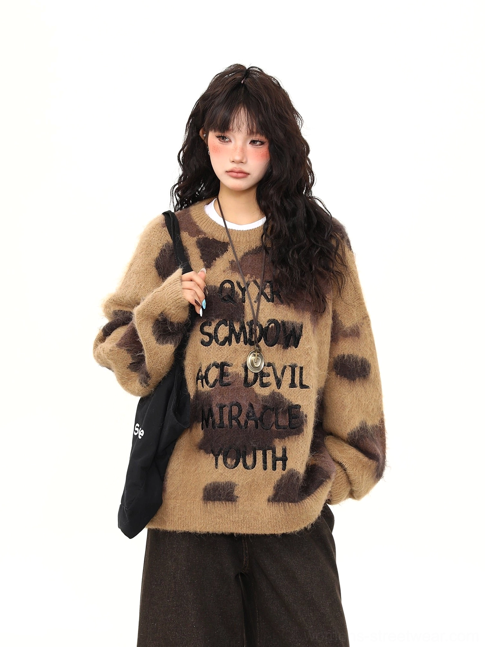 Brown fuzzy graphic crew neck sweater styled as a relaxed Korean streetwear outfit