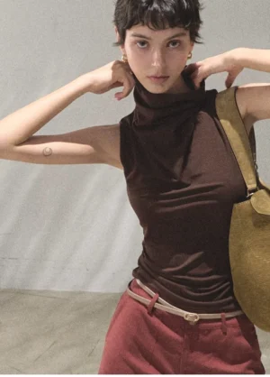 Mocha draped mock neck sleeveless slim fit streetwear top front close-up on model