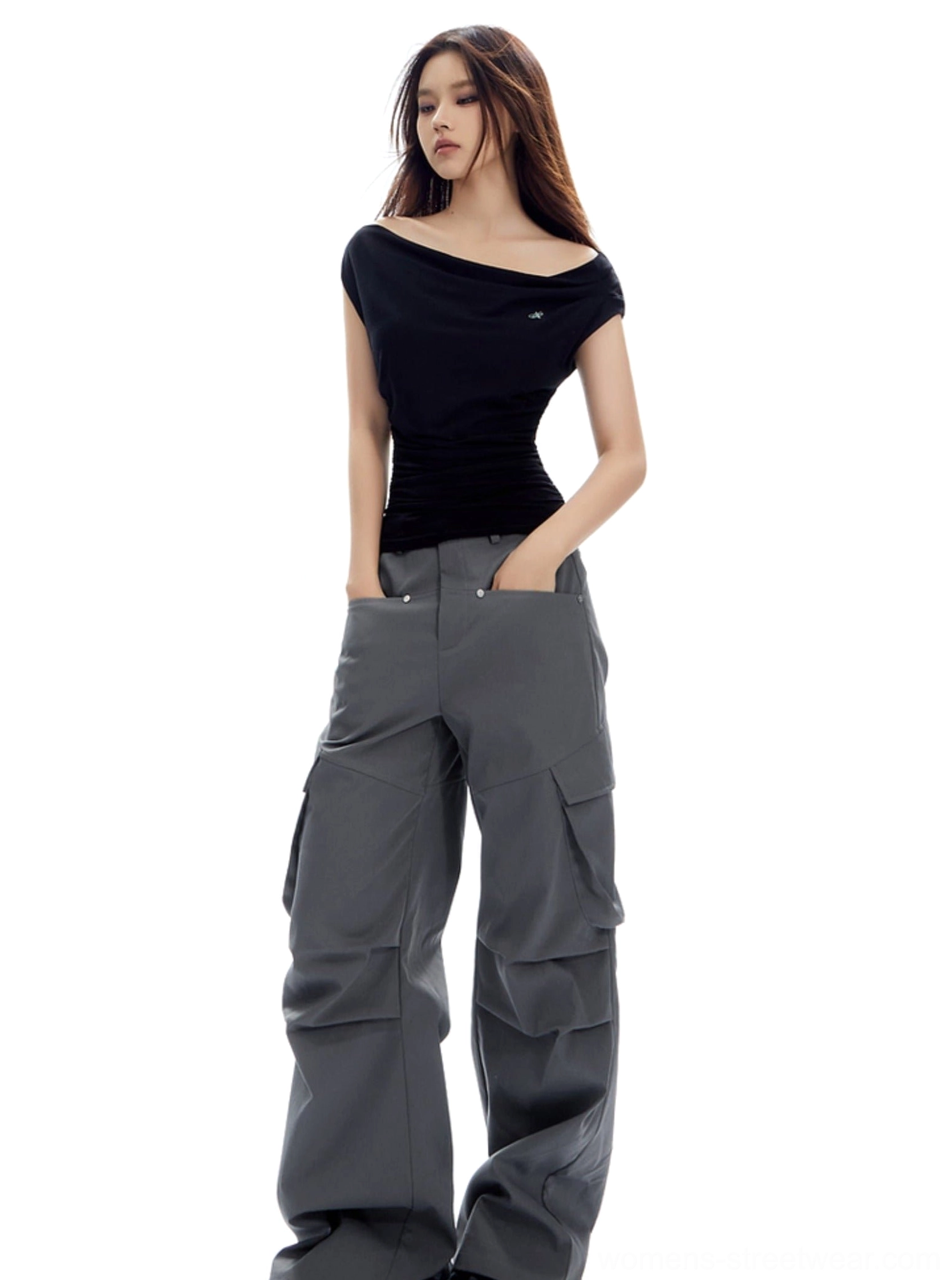 Modern asymmetrical ruched top featuring a sculpted waist and expressive one-shoulder streetwear design