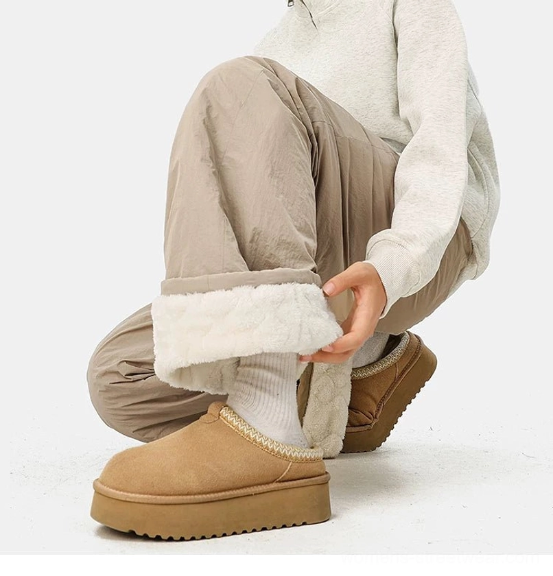 Modern convertible fleece-lined pants with a loose wide-leg shape for gorpcore and winter streetwear outfits