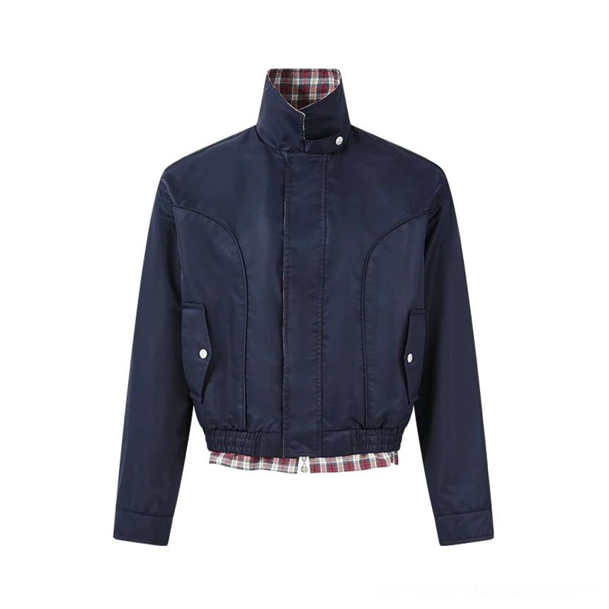 Modern plaid-lined jacket product image featuring a stand collar zip closure and relaxed cropped blouson shape