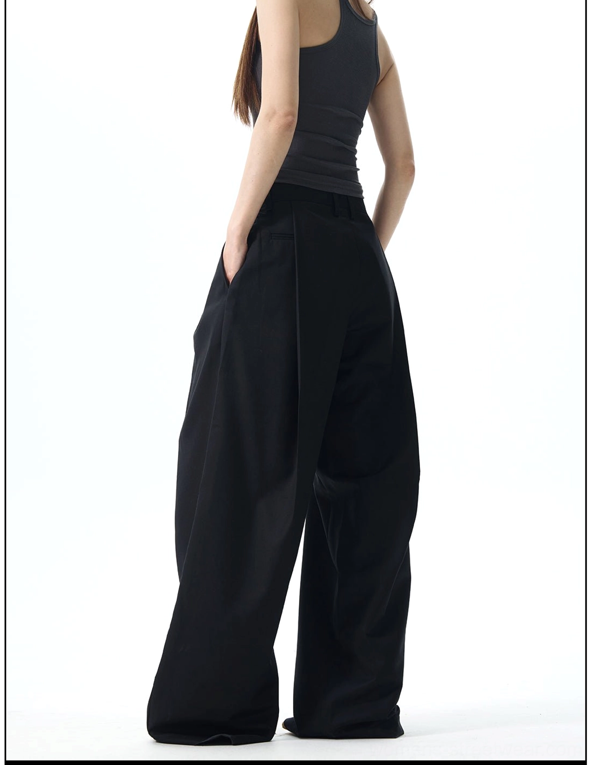 Modern pleated wide-leg trousers designed for minimalist streetwear, elevated workwear, and contemporary Korean styling