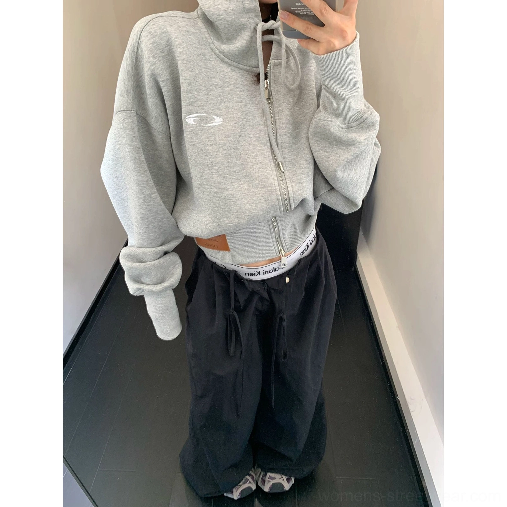 Modern Seoul fashion cropped zip hoodie in a relaxed oversized silhouette with weathered wash, metal zipper, and everyday layering design