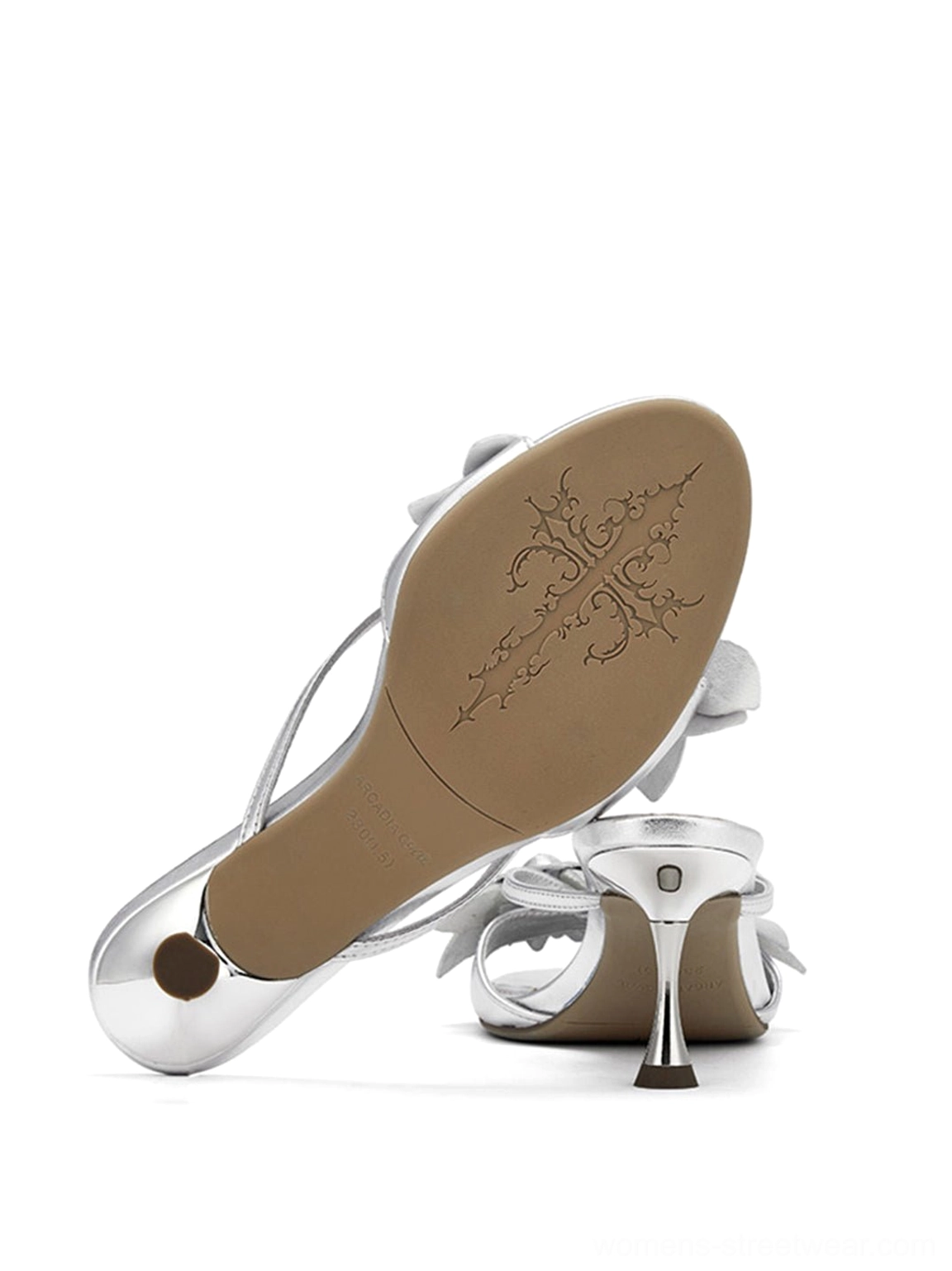 Modern silver kitten heel slide sandals for women with dimensional floral detailing, delicate straps, and a polished open toe profile