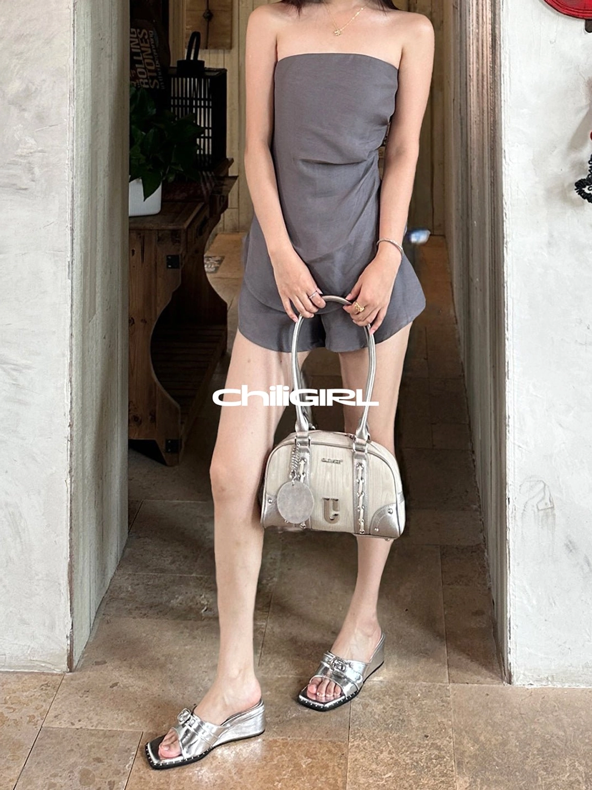 Modern square-toe buckle sandals with low wedge heel open front and decorative studded outsole