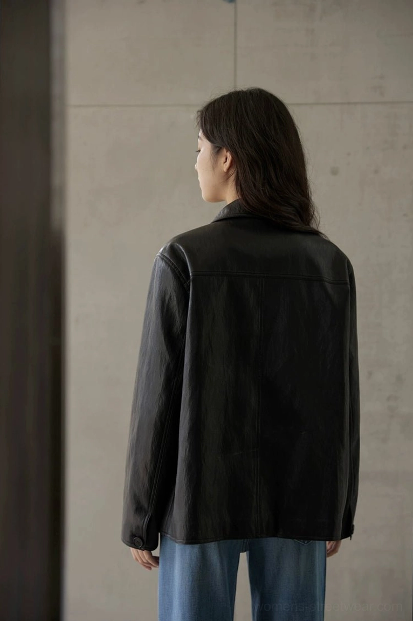 Modern vintage short jacket in leather-look fabric with polished button-front streetwear styling