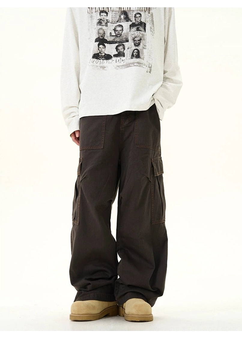 Modern wide-leg cargo pants featuring a mid-rise waist roomy legs and functional utility pocket design