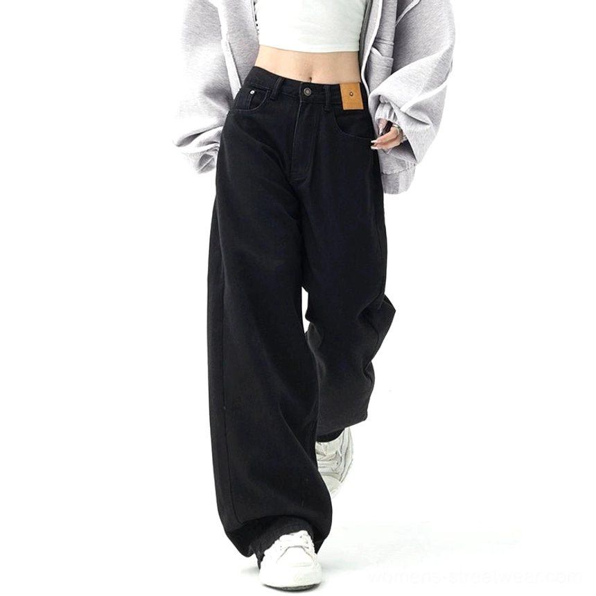 Modern women's wide-leg denim pants with a relaxed fit, high waist, full-length silhouette, and styling potential for Y2K street fashion