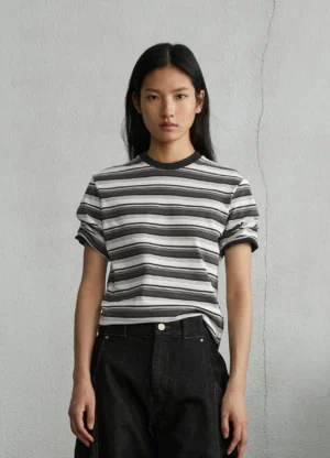 Monochrome striped unisex Korean streetwear T-shirt front view styled with black wide-leg jeans