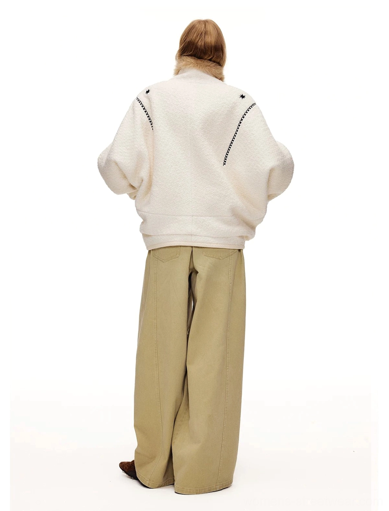 Full back view of the moonlight white fleece jacket showing embroidered shoulder and hem detailing