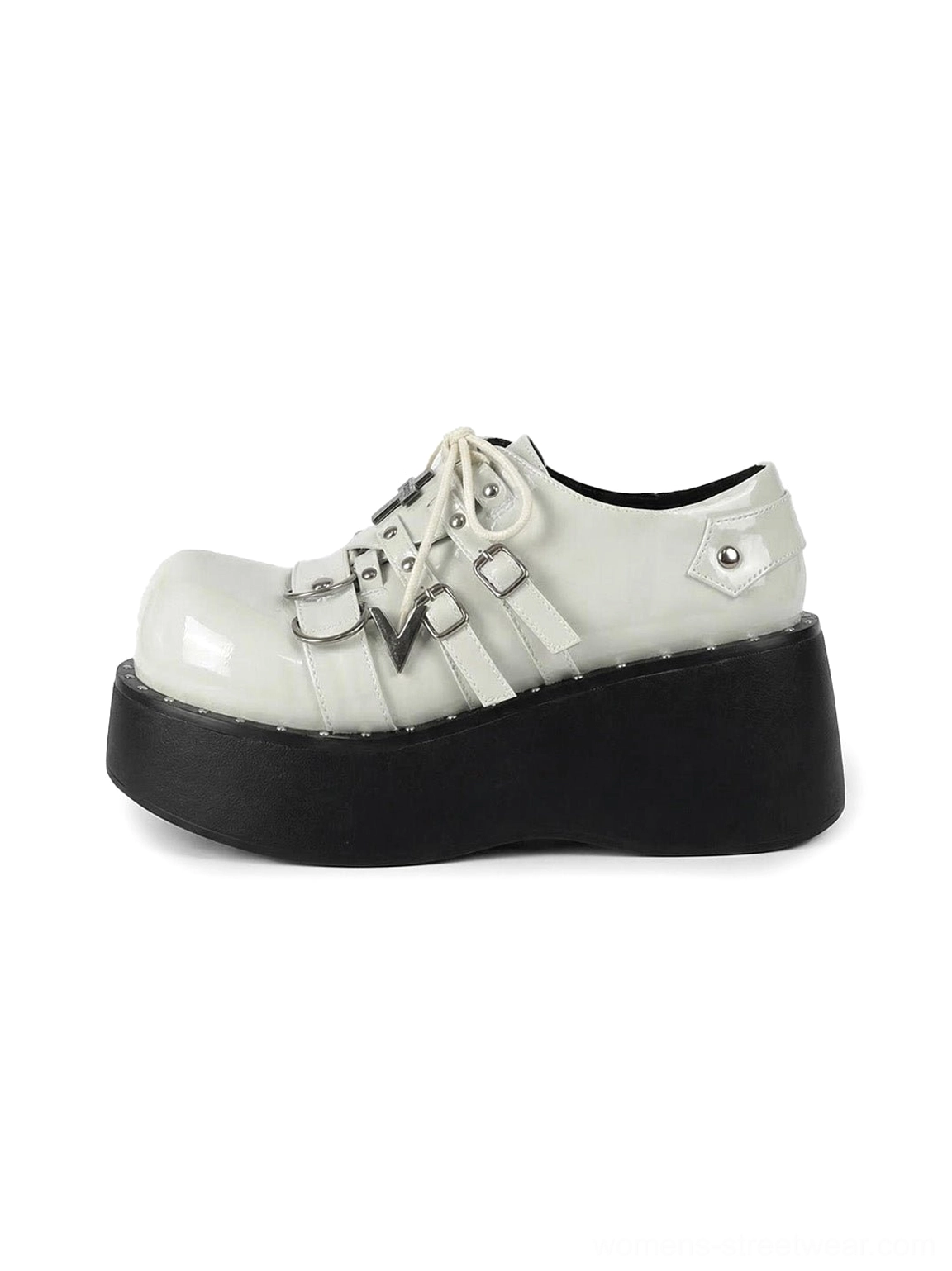 White patent Gothic platform Mary Jane shoes with lace-up front, double buckle straps, and black wedge platform sole