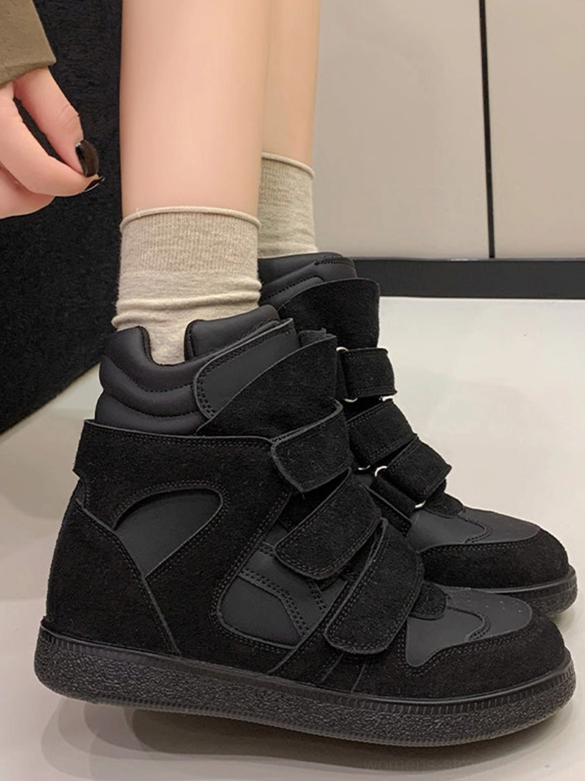 Multi-strap hidden-wedge high-top sneakers for women with lace-up front, layered hook-and-loop straps, padded high collar, and elevated streetwear silhouette