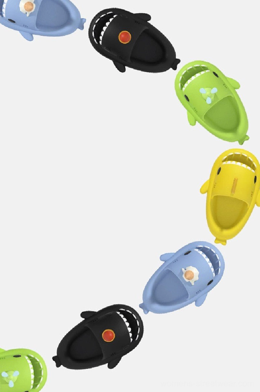 Multi-style shark slide slippers arranged in a curved chain showing colorful character designs