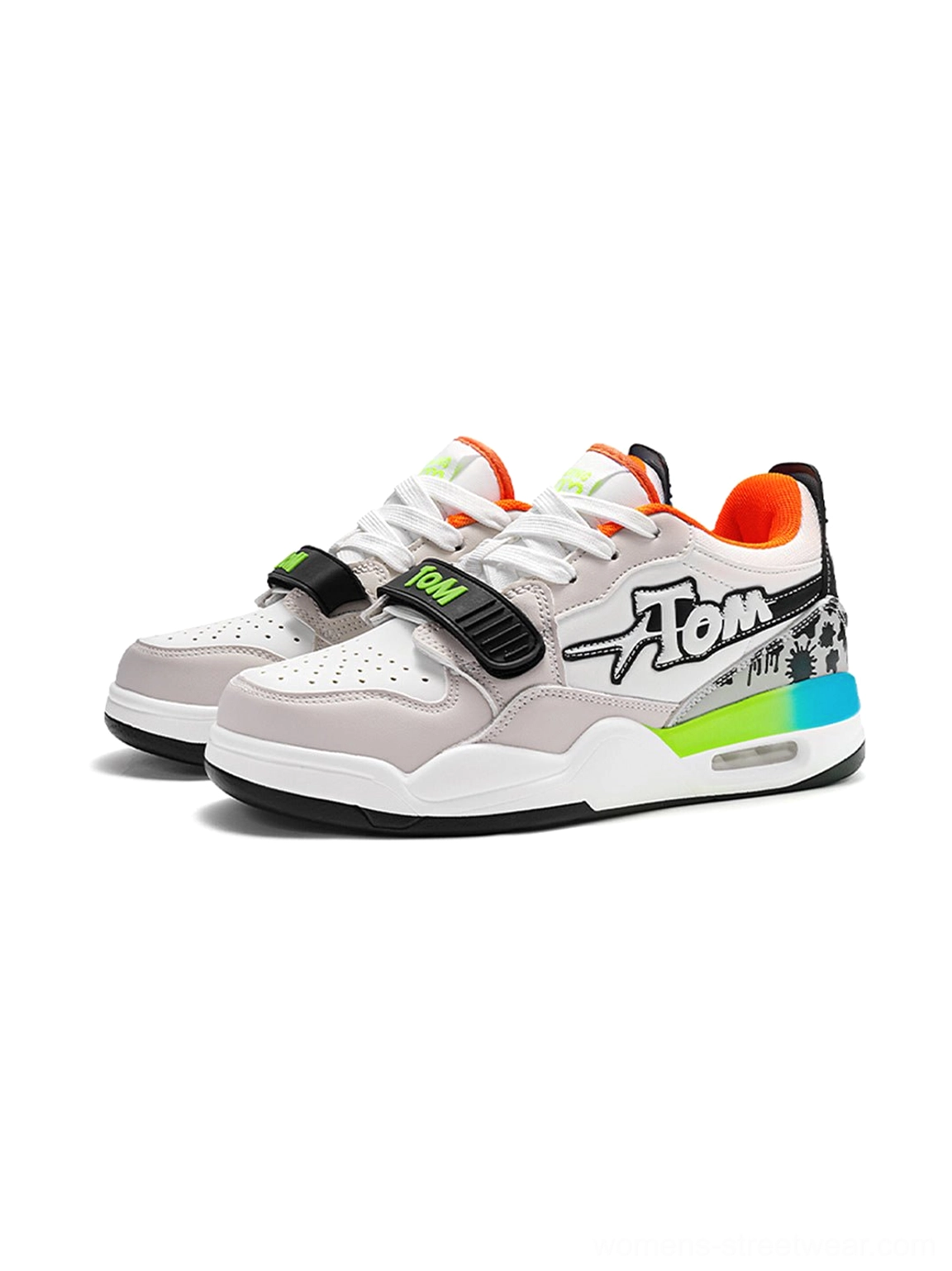 Multicolor colorblock basketball-inspired streetwear sneakers with neon green and blue heel accent, orange lining, adjustable strap, and chunky cushioned sole
