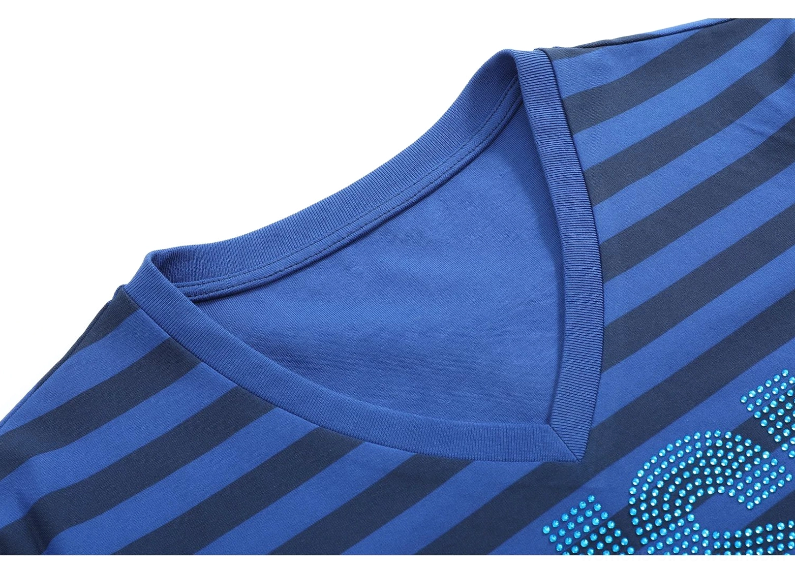 Close-up detail of the ribbed V-neckline on the deep blue striped rhinestone streetwear tee