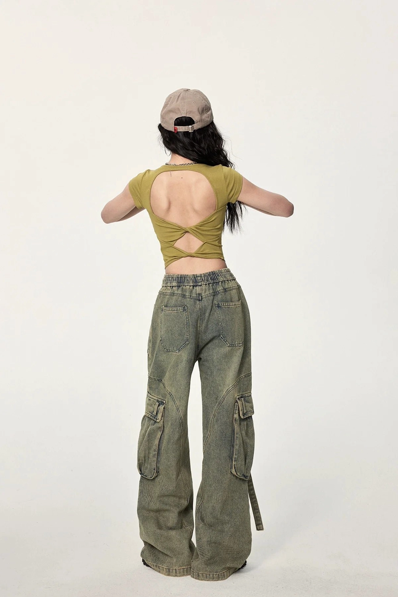 Mustard yellow cropped ribbed tee with open back twist detail, sweetheart front neckline, short sleeves, and versatile Y2K outfit appeal