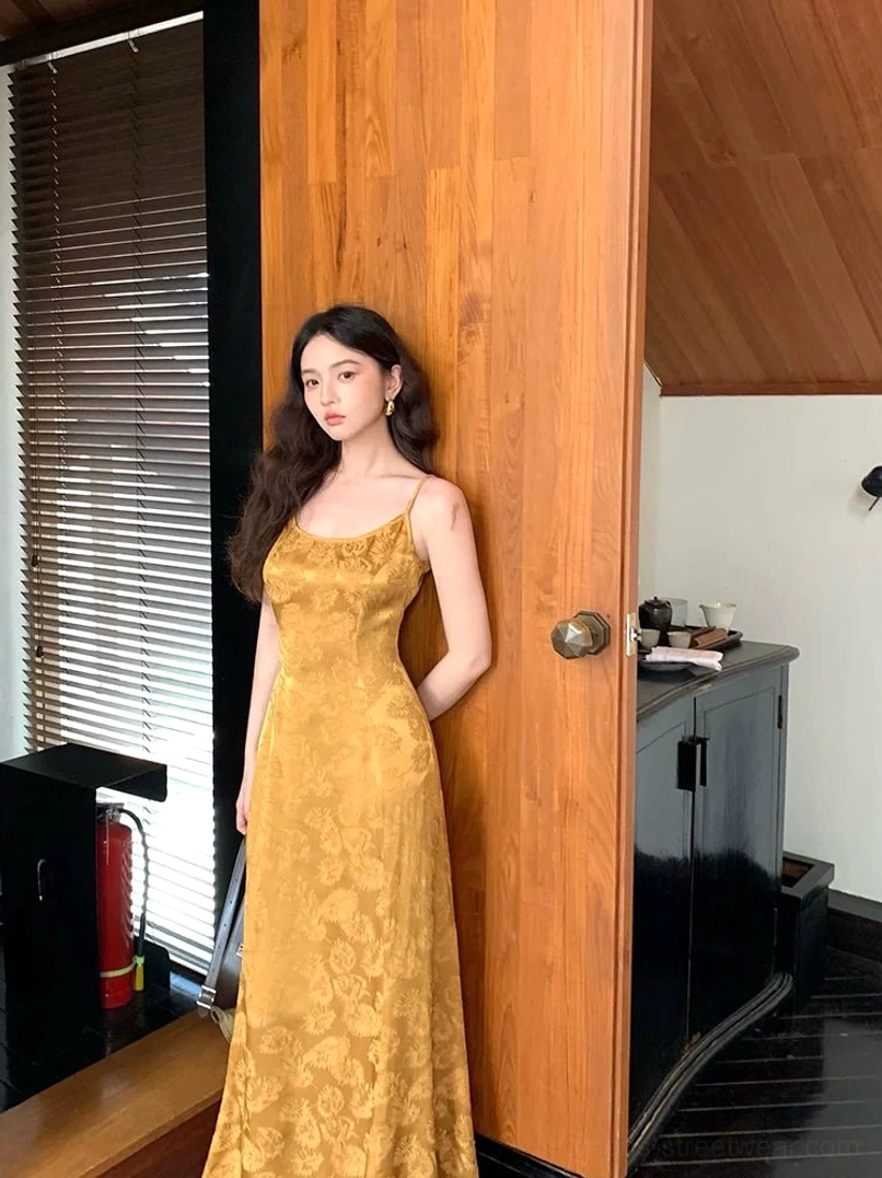 Mustard yellow floral jacquard satin fishtail maxi slip dress with delicate spaghetti straps front view