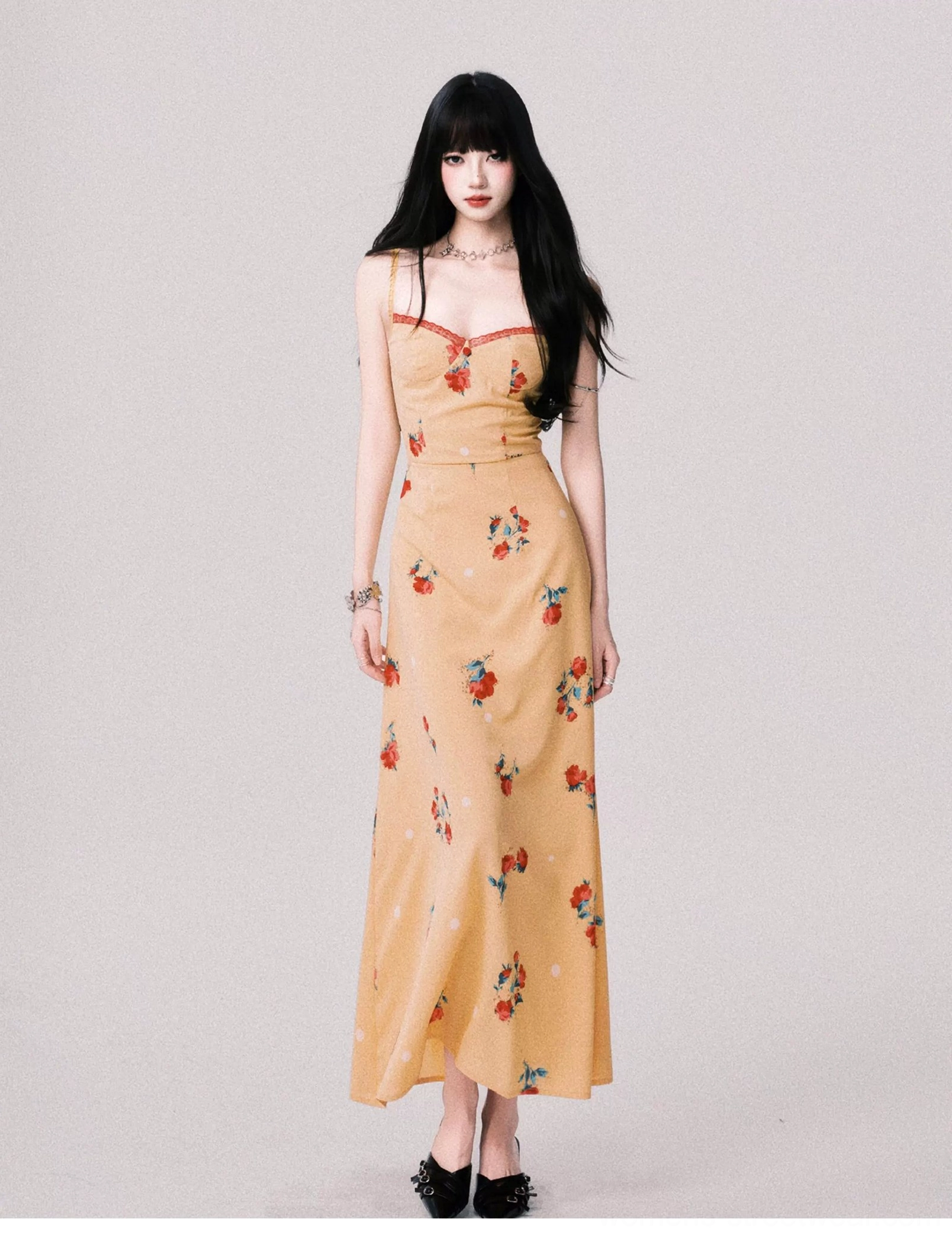 Mustard yellow floral maxi dress with slim silhouette floor length skirt and delicate camisole straps styled with black bow flats