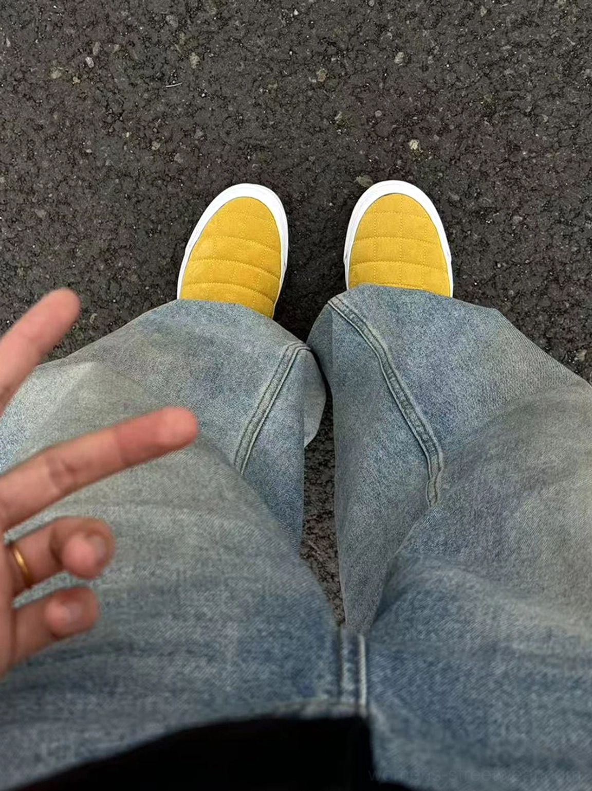 Mustard yellow quilted slip-on sneaker mules with padded diamond panels and contrasting white rubber outsole