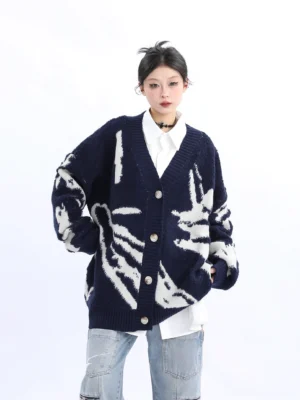 Navy blue abstract pattern oversized V-neck knit cardigan shown from the front with button closure, drop shoulders, and relaxed Seoul streetwear styling