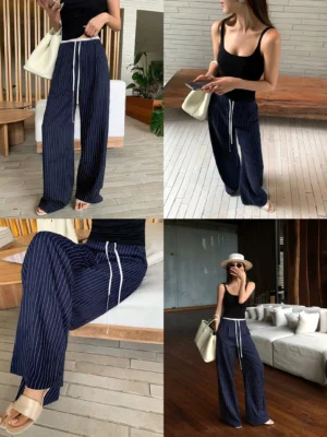 Navy blue pinstripe drawstring wide leg pants shown in multiple casual views with relaxed streetwear styling and beige slide sandals