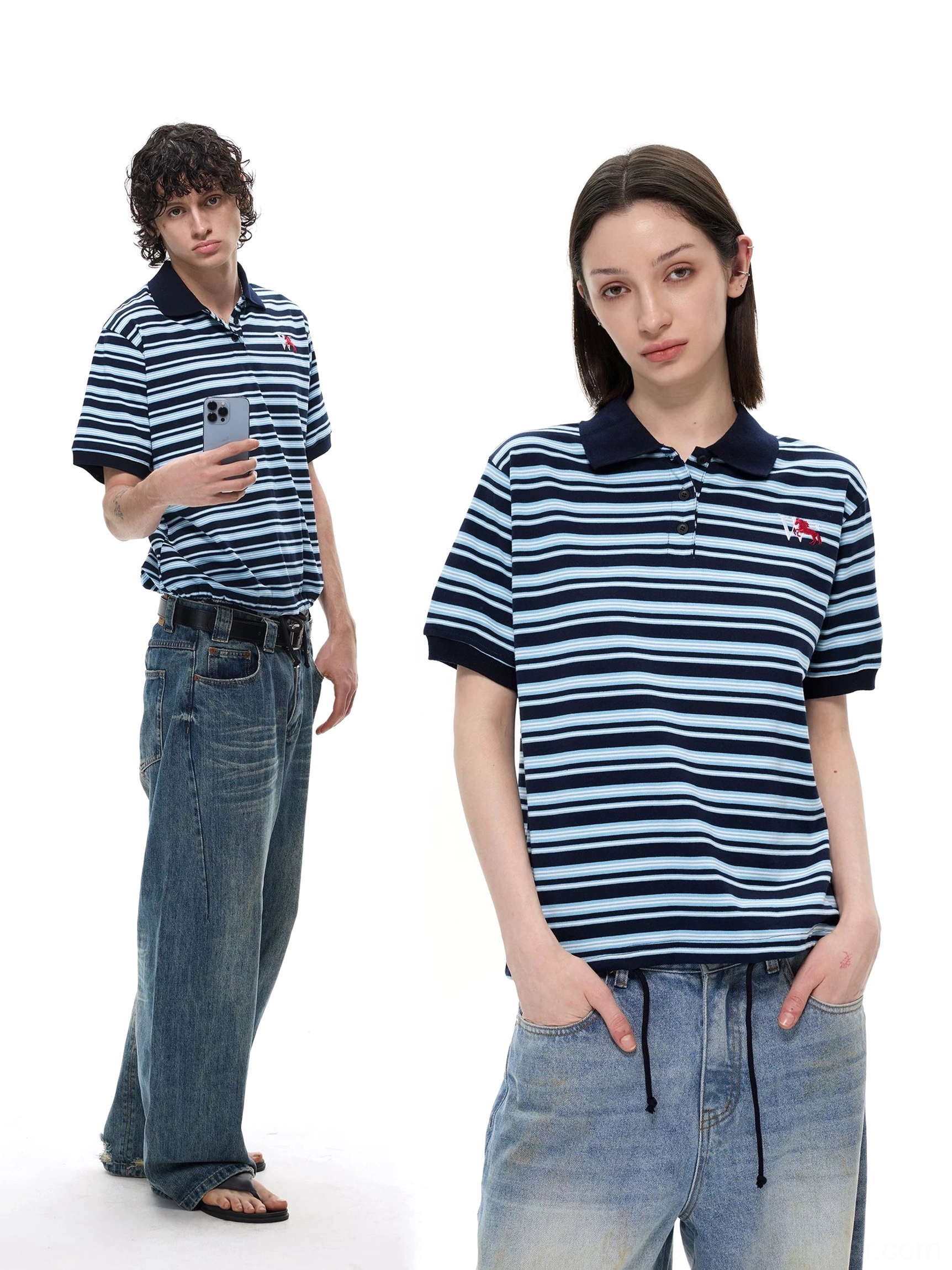 Navy blue striped retro polo shirt with contrast collar styled with vintage wide leg jeans in side view