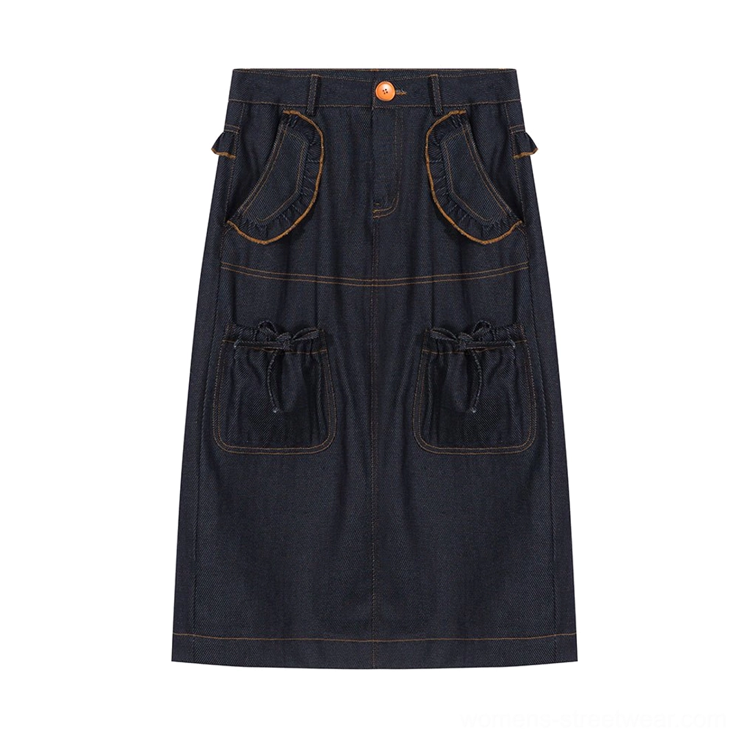 Navy denim utility pocket midi skirt flat lay front view with curved pockets brown topstitching and drawstring details