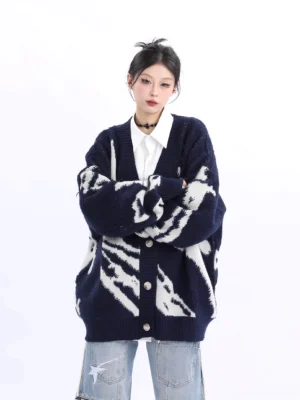 Front view of a navy and off-white abstract knit cardigan with ribbed trim, button placket, and oversized Korean streetwear silhouette