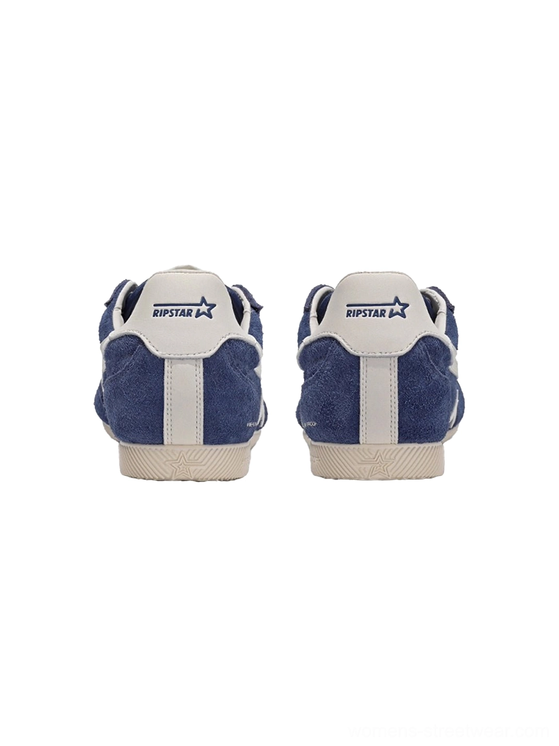 Navy blue retro suede sneakers shown from the back with contrasting heel tabs and off-white heel detailing