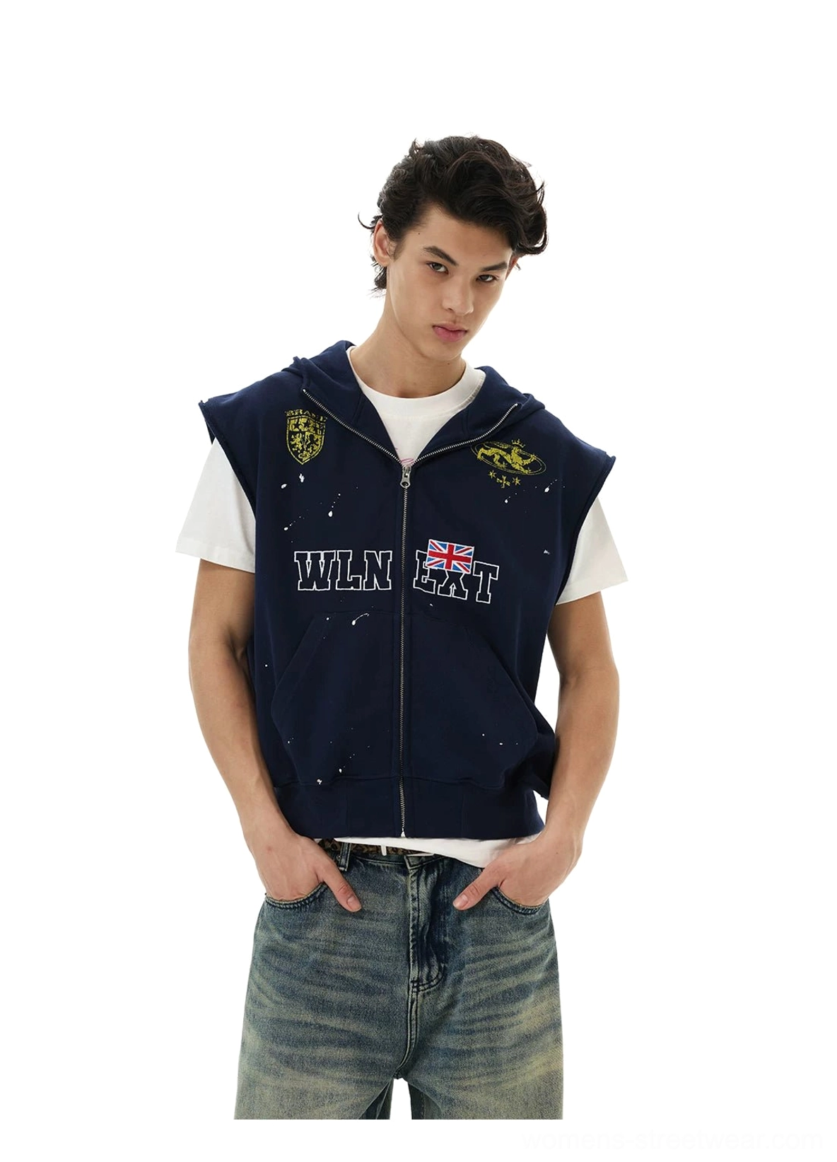 Front half-body view of navy sleeveless hoodie vest layered over white T-shirt with flag graphic and relaxed fit