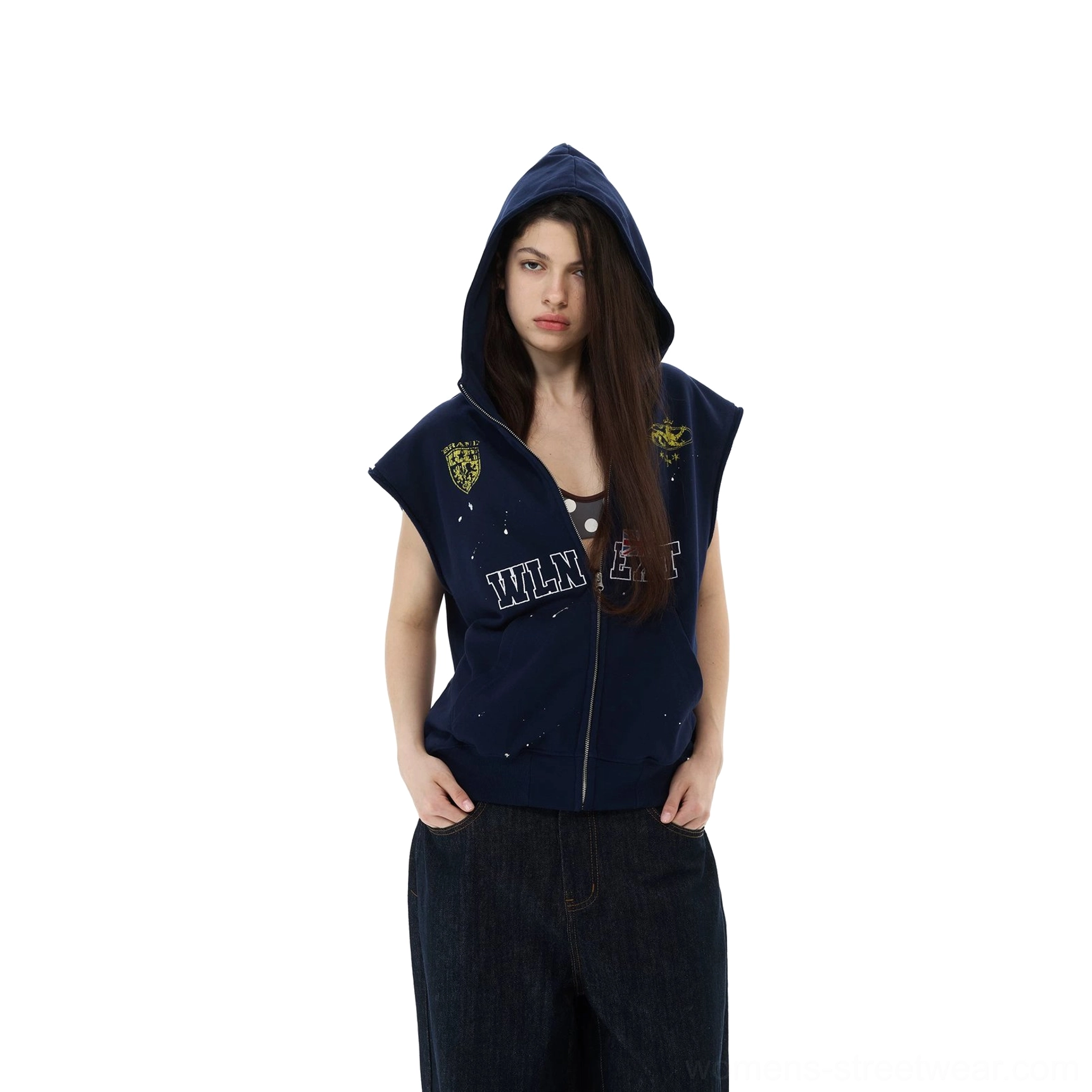 Navy sleeveless zip-up hoodie vest with collegiate crest graphics, flag artwork, raw edges, and vintage streetwear styling