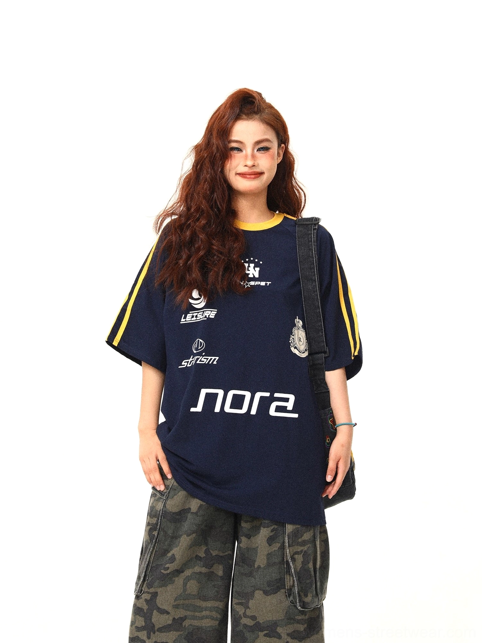 Navy blue oversized sporty graphic t-shirt with yellow collar and sleeve stripes front view streetwear outfit