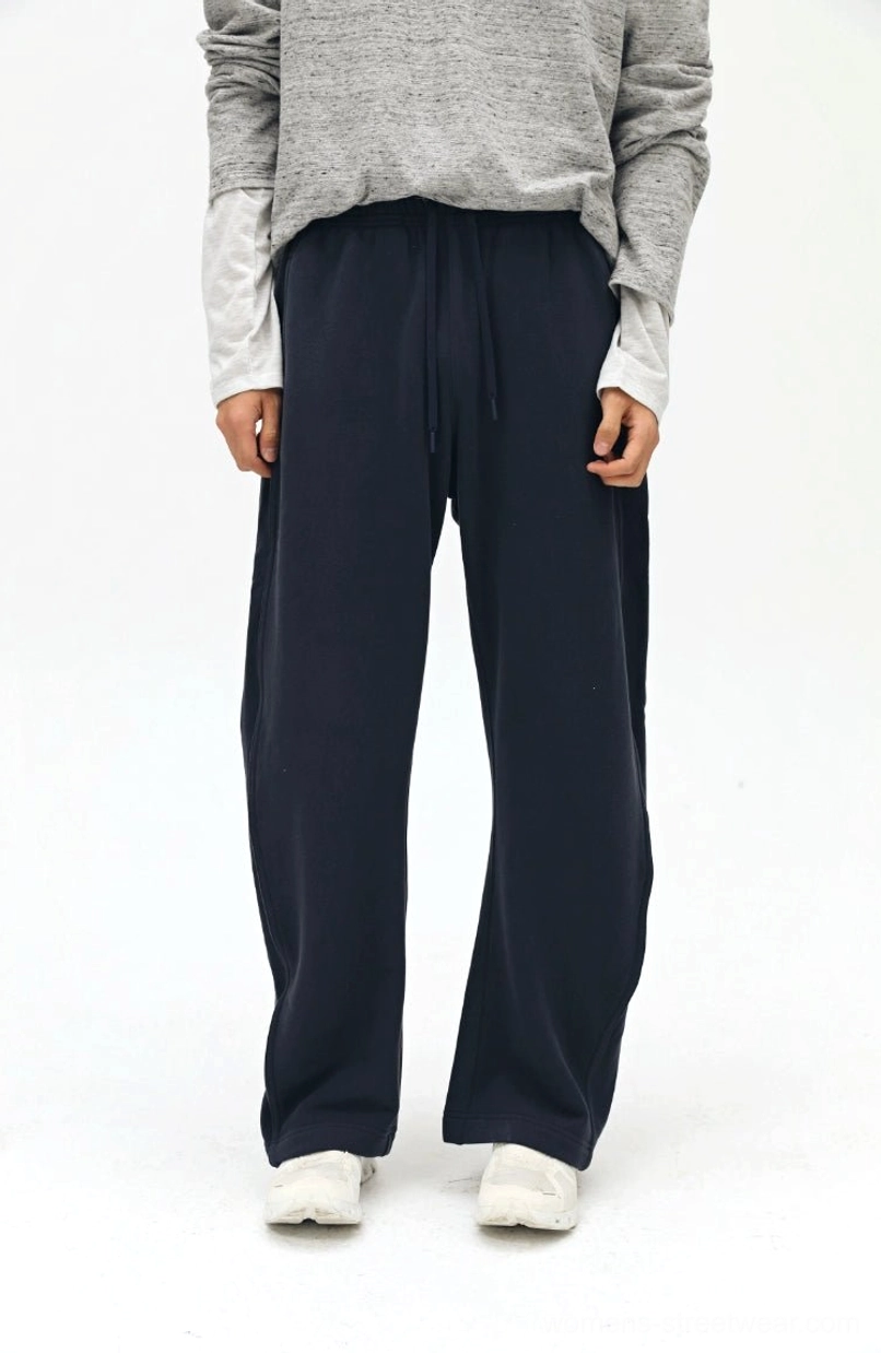 Navy blue twill sweatpants with subtle side seam details - front view elastic drawstring waist design