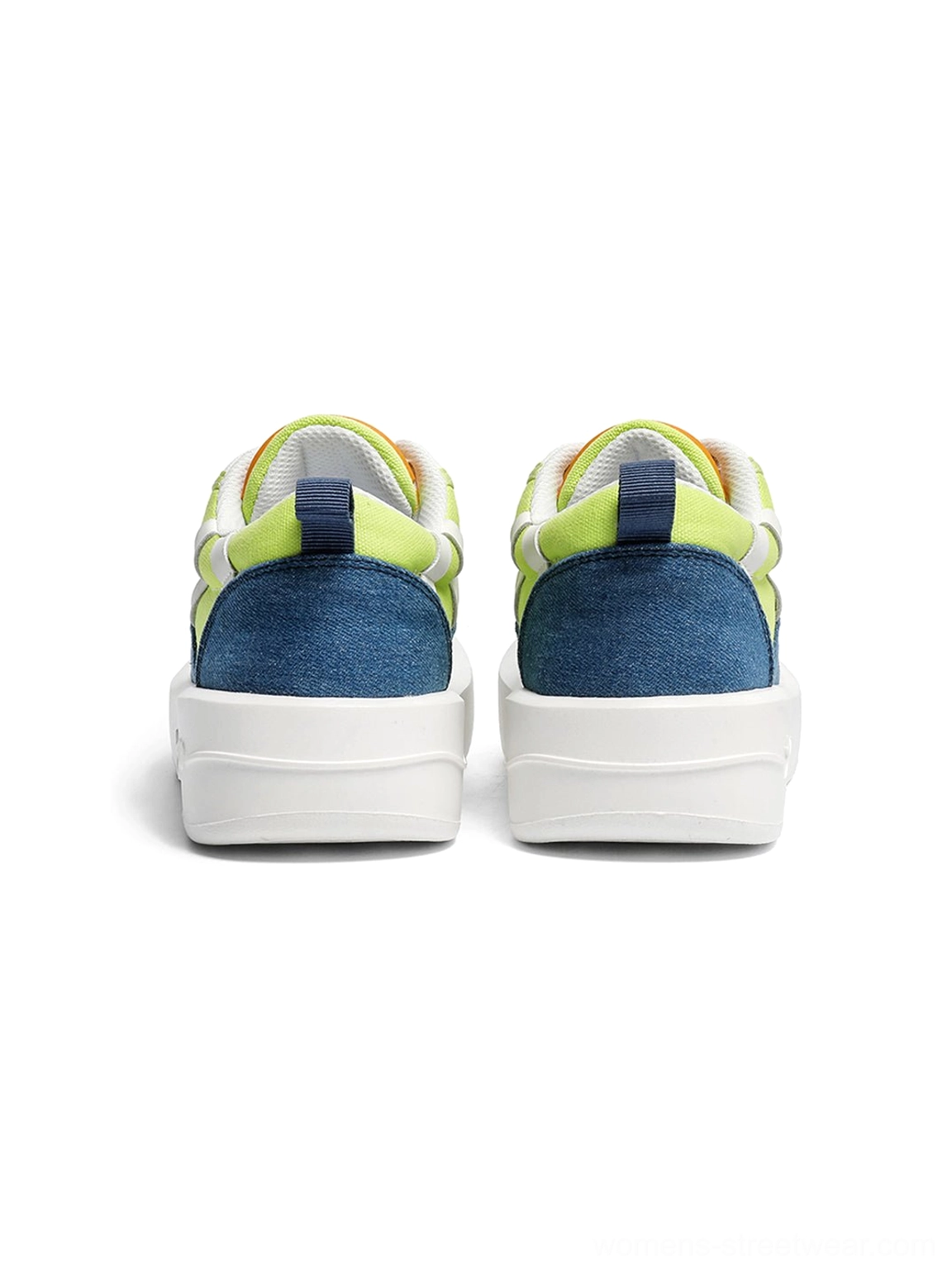 Rear view of neon colorblock canvas platform sneakers showing dark blue heel panels and clean white soles